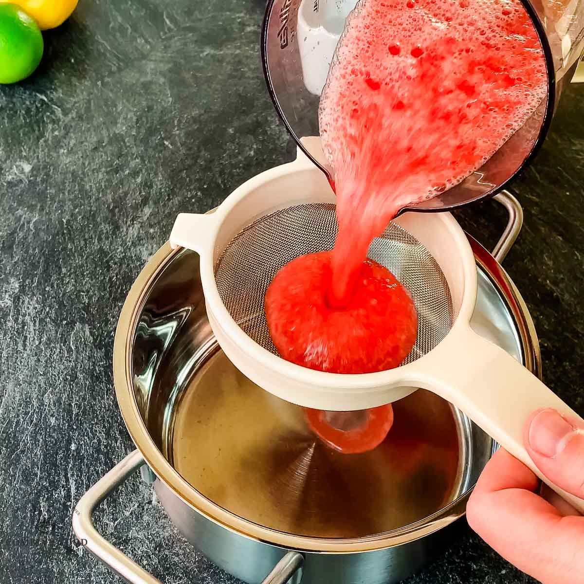 Strain the watermelon purée through a close meshed sieve.