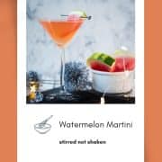 Gorgeous watermelon martini with a watermelon garnish, placed on a black slate plate.