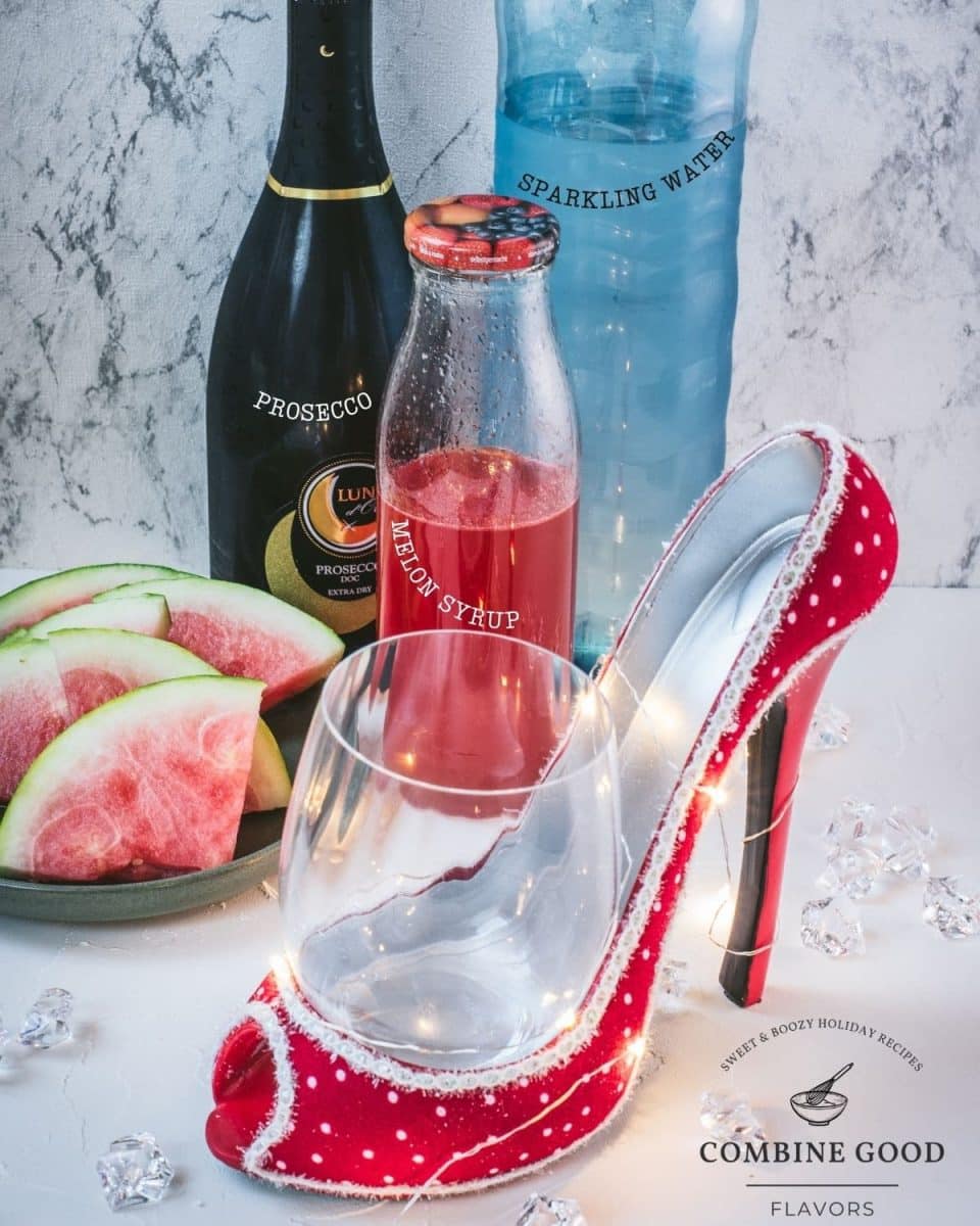 Ingredients for watermelon spritz with prosecco - watermelon syrup, sparkling water, prosecco.