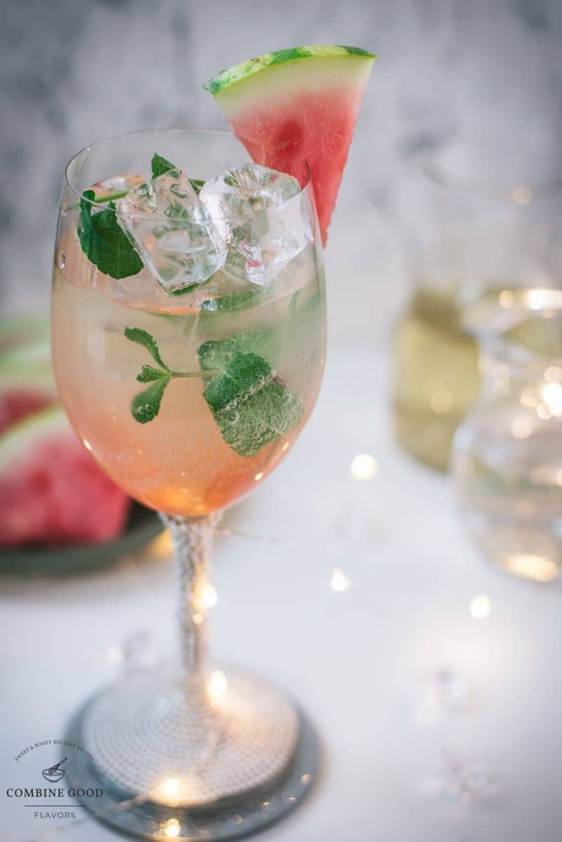 Gorgeous wine glass filled with watermelon spritzer.