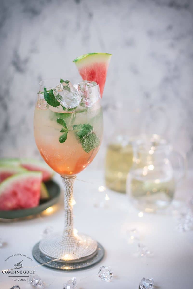 Gorgeous wine glass filled with watermelon spritzer.