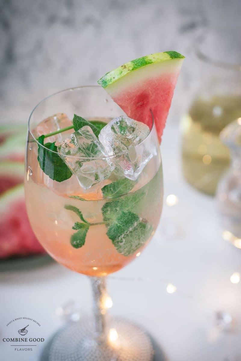 Gorgeous wine glass filled with watermelon spritzer.