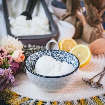 Delicious lemon sorbet served in white and blue patterned bowl.