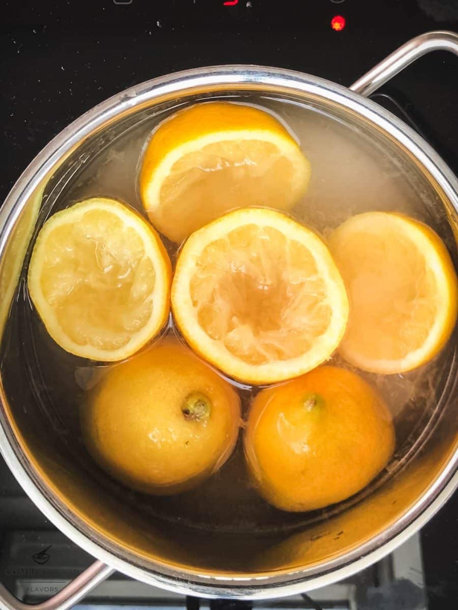 Bring the lemons, sugar and water to the boil.