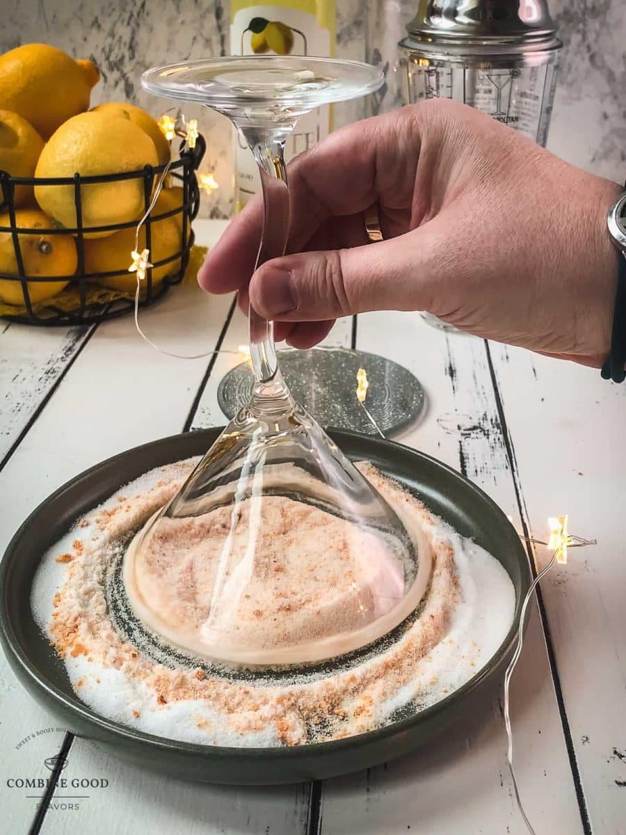 Dip the glass into the orange sugar mix, turning to coat.