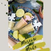 Gorgeous and refreshing Moscow mule popsicles placed on patterned plate.