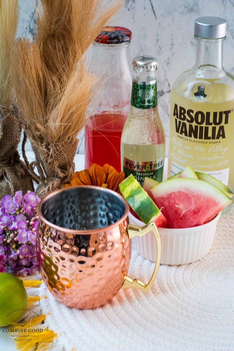 Ingredients watermelon Moscow mule - watermelon syrup, vanilla vodka, ginger beer, and fresh lime juice.