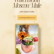 Gorgeous copper mug, filled with a delicious watermelon Moscow mule. Garnished with watermelon slices and mint leaves.