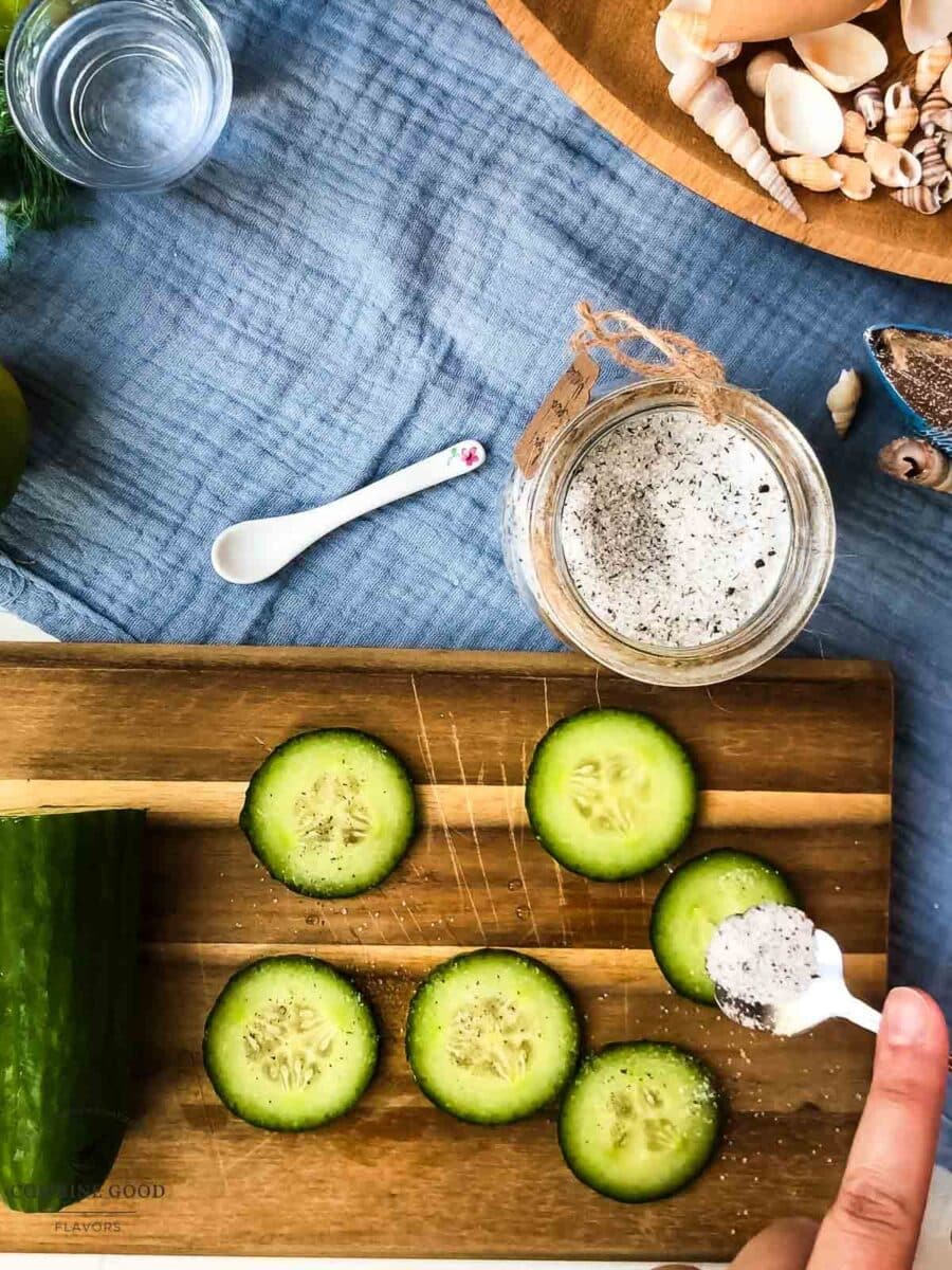 Add homemade mint sugar on top of the cucumber slices.