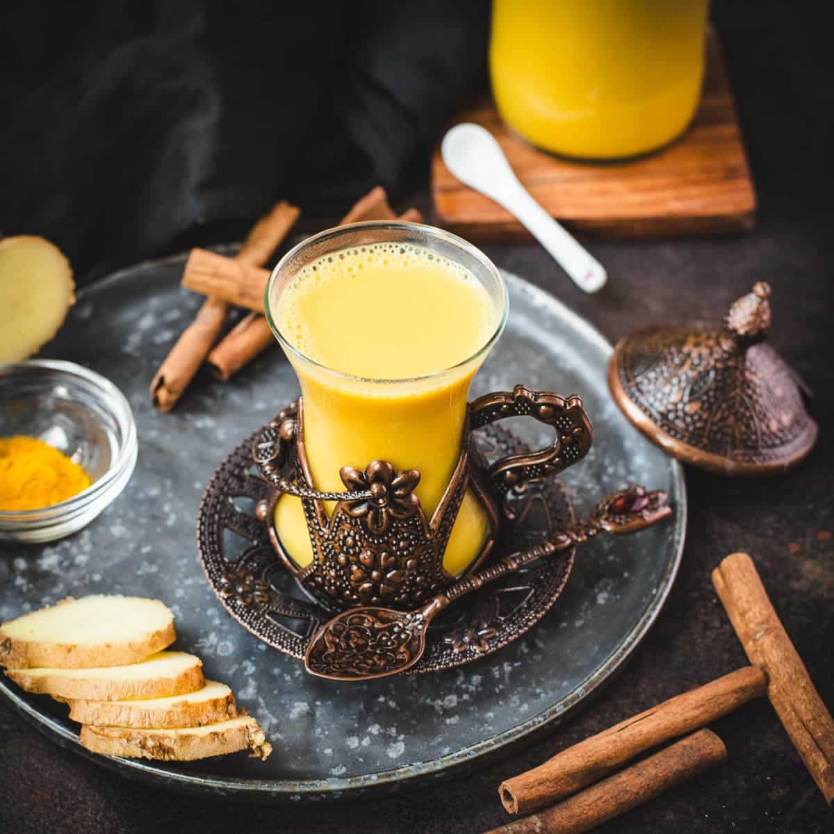Gorgeous medieval coffee cup filled with delicious spiced almond milk.