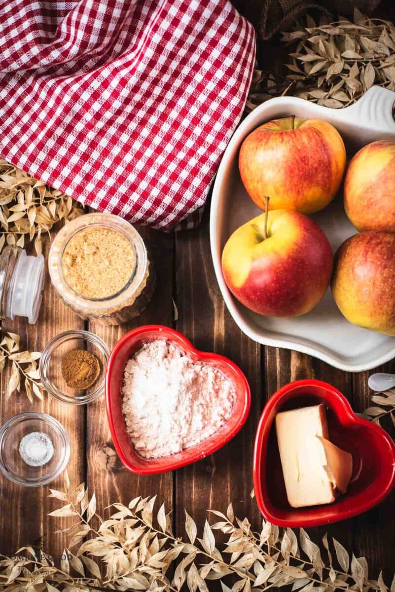 Ingredients apple crisp without oatmeal - brown sugar, cinnamon, salt, flour, butter, apples.