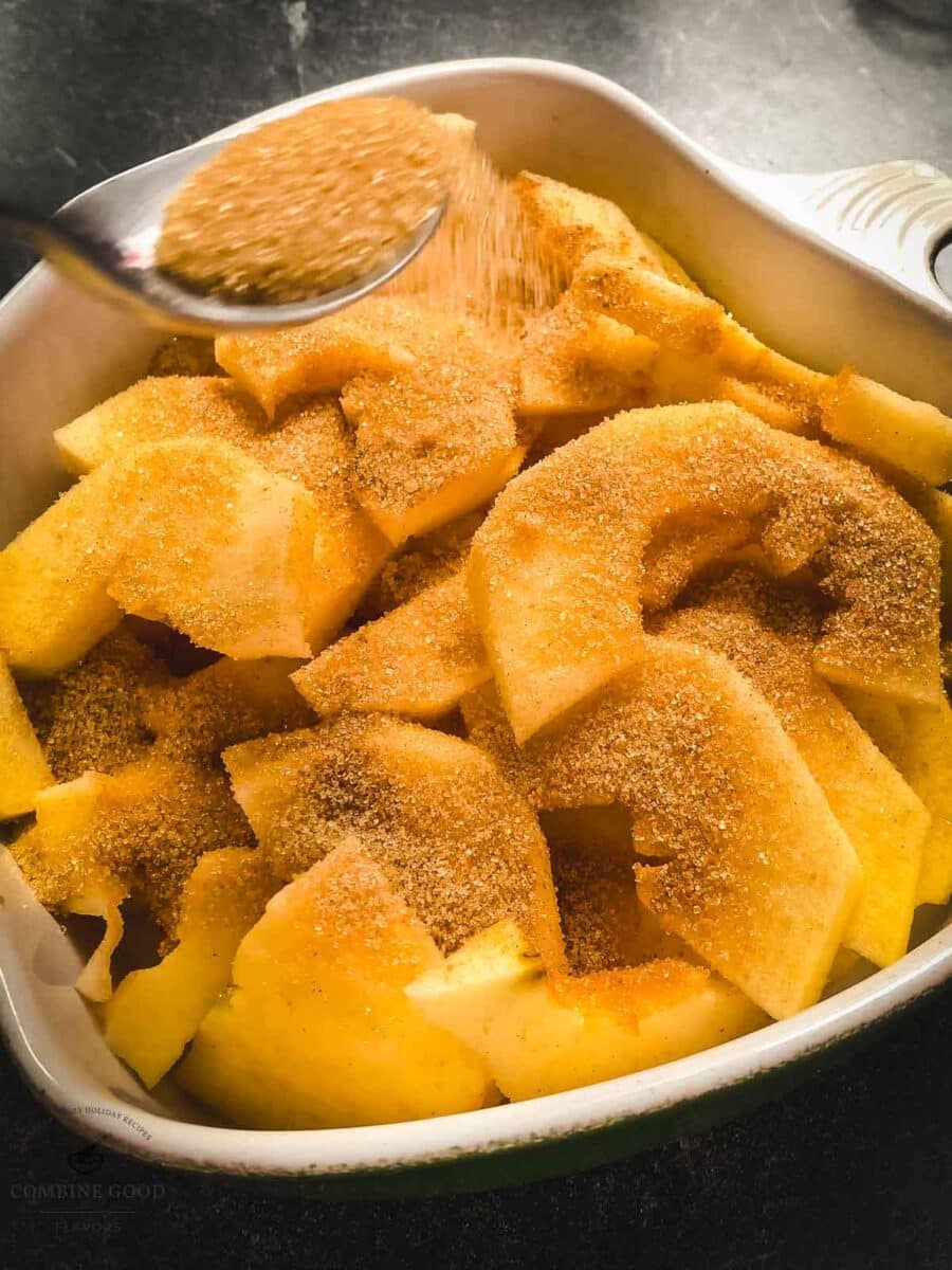 Sprinkle the cinnamon sugar mixture over the sliced apples.