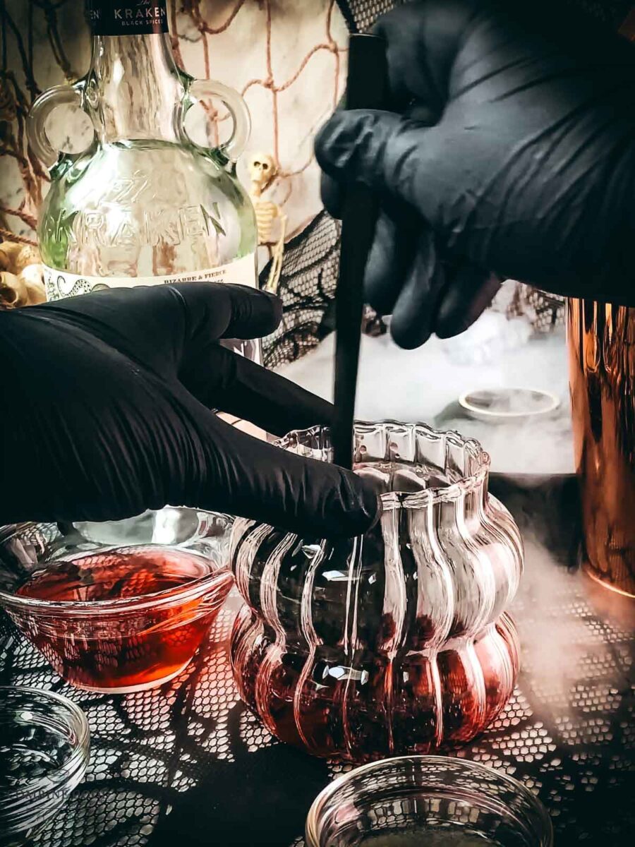 Muddle the cranberries in the serving glass.