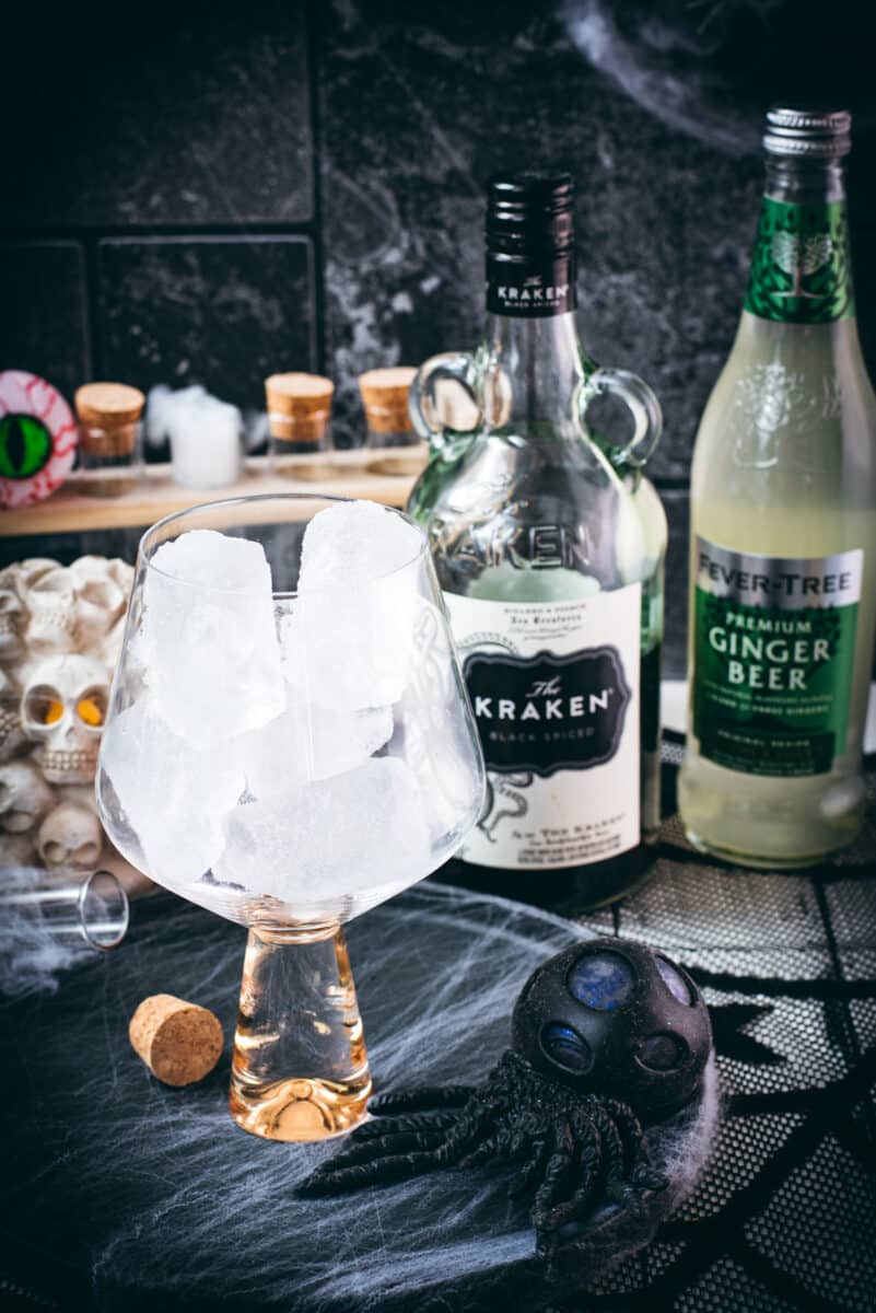 Ingredients ginger beer kraken - Cubed ice, The Kraken Black Spiced rum and Fever Tree Ginger beer.