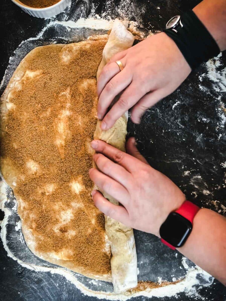 Roll the dough tightly from the wide side and use kitchen string to cut it into finger-thick slices.