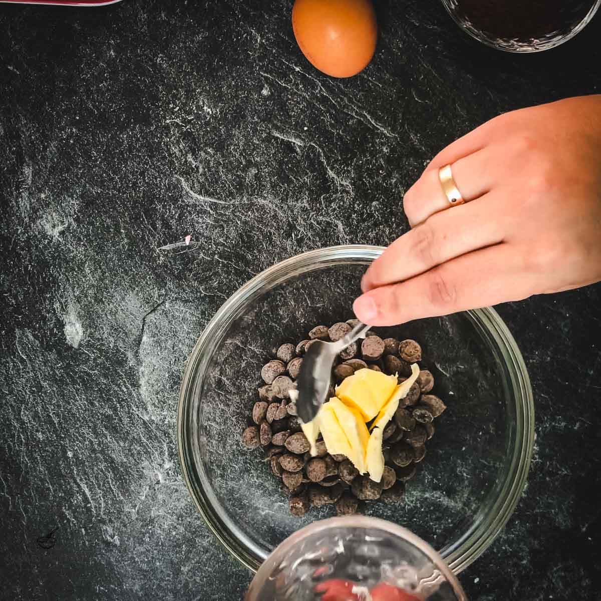 Add butter to the chocolate pieces.