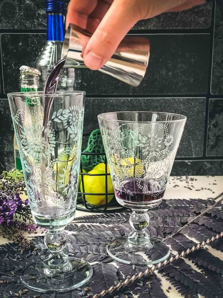 Add lavender syrup to the serving glasses.