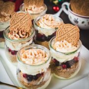 Gorgeous mini Christmas triffles with delicious speculoos cookies, a mascarpone cream mix, and frozen berries.