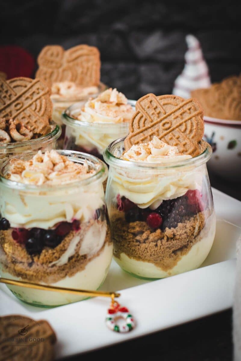 Gorgeous mini Christmas triffles with delicious speculoos cookies, a mascarpone cream mix, and frozen berries.