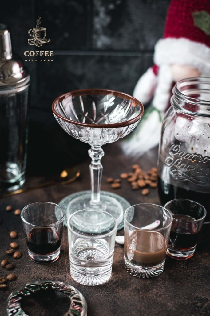 Ingredients - mocha martini - coffee liqueur, cold brew, vodka, coffee liqueur, and cubed ice for the shaker.