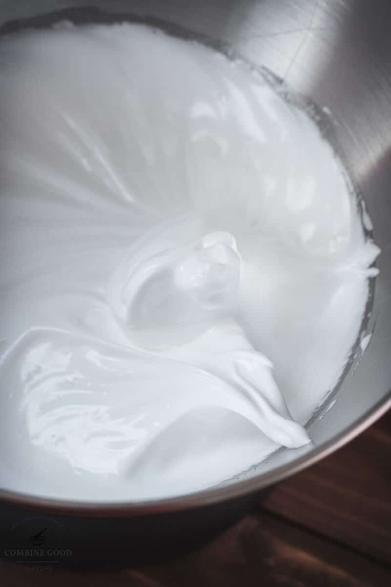 Beat the egg whites with the sugar until creamy,