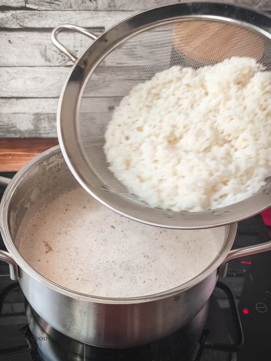 Add the cooked rice to the vanilla milk mix.