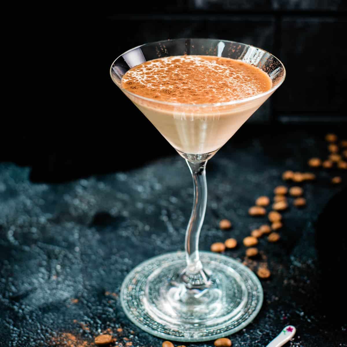 Oh so delicious mudslide cocktail, placed on a glass coaster.