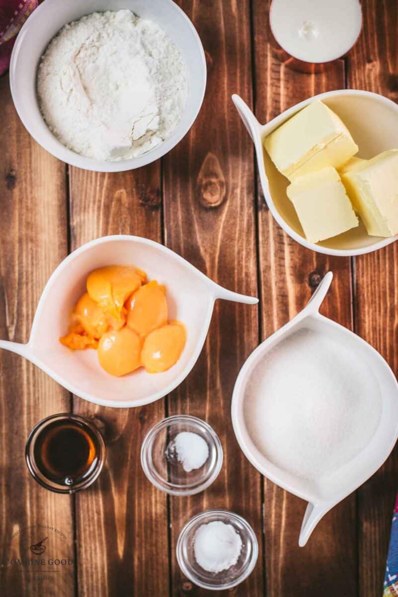 Ingredients six egg yolk bundt cake - egg yolks, flour, milk, butter, sugar, vanilla extract, salt, and baking powder.