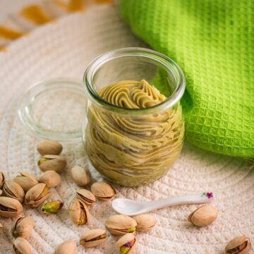 Preserving glass filled with scrumptious white chocolate pistachio ganache.