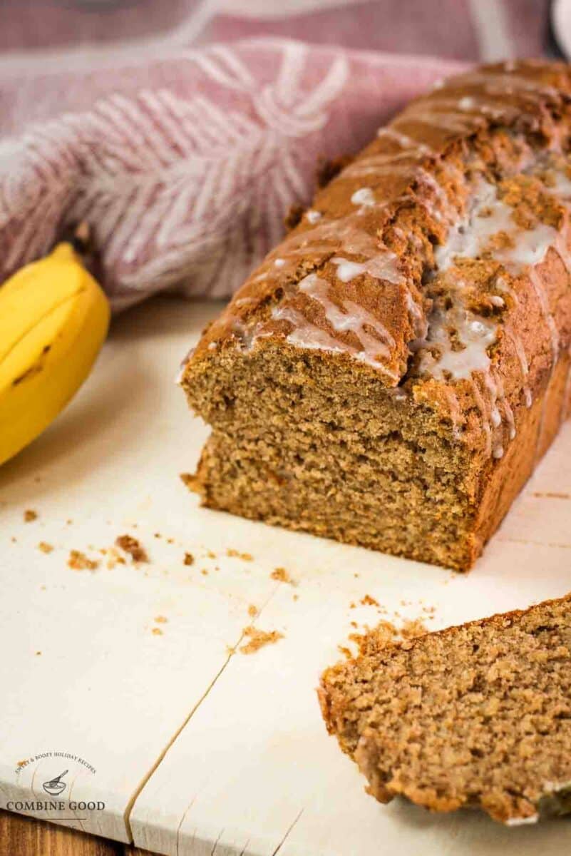 Delicious low sugar banana loaf bread, with light sugar glaze drizzled over the banana bread.