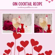 Valentines gin cocktail, garnished with a gorgeous flamingo cocktail pick, served in wine glass. Placed on a mirrored coaster next to a heart shaped flask.