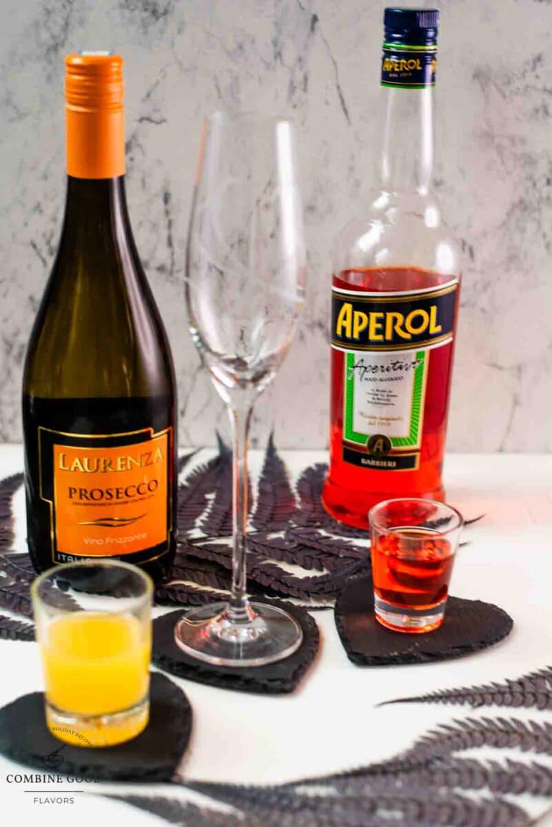 Ingredients - Aperol MImosa - Orange juice, Aperol, Prosecco.