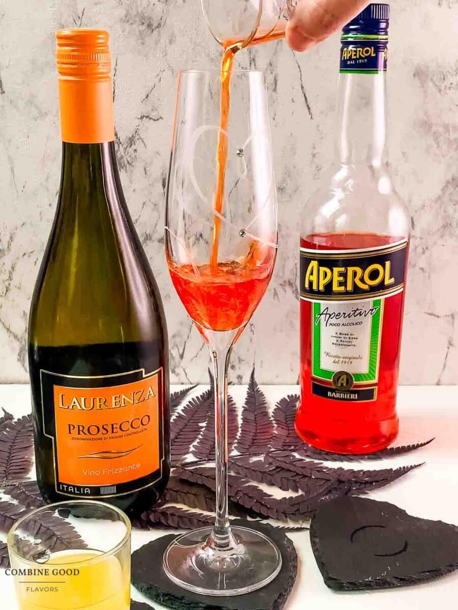 Add Aperol to the champagne glass.