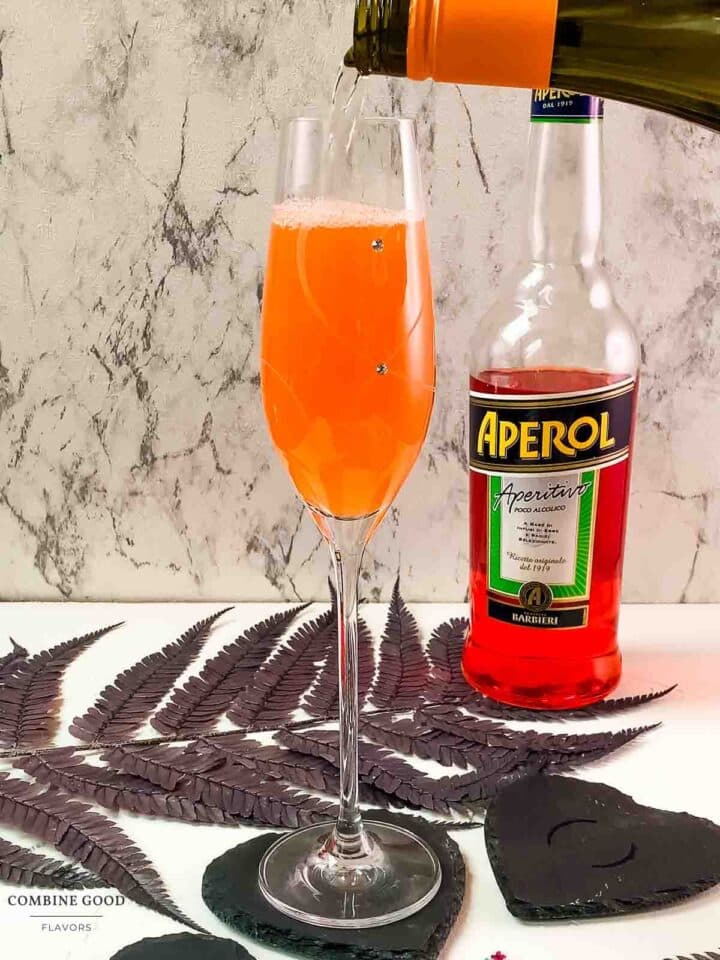 Top the Aperol and orange juice with Prosecco.