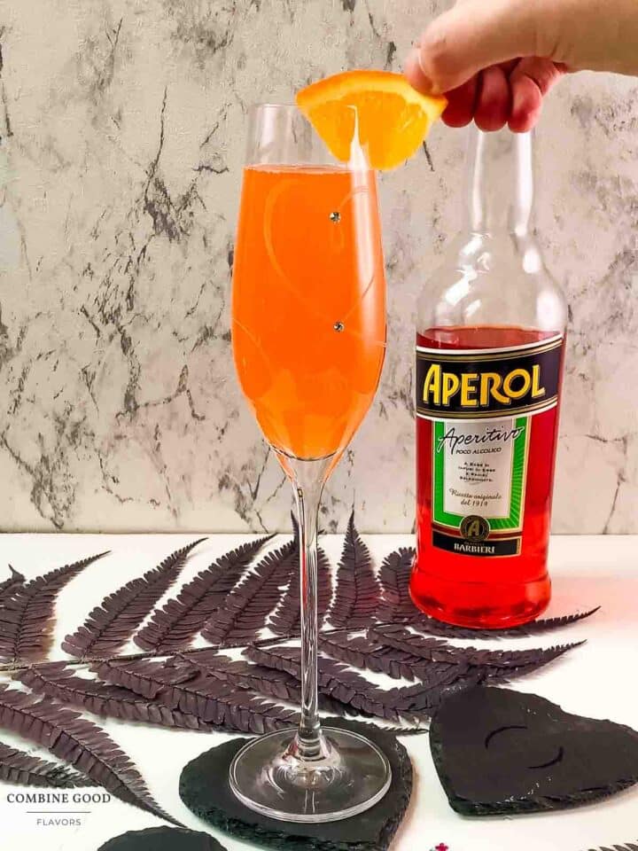 Garnish the Aperol mimosa, with a slice of orange.