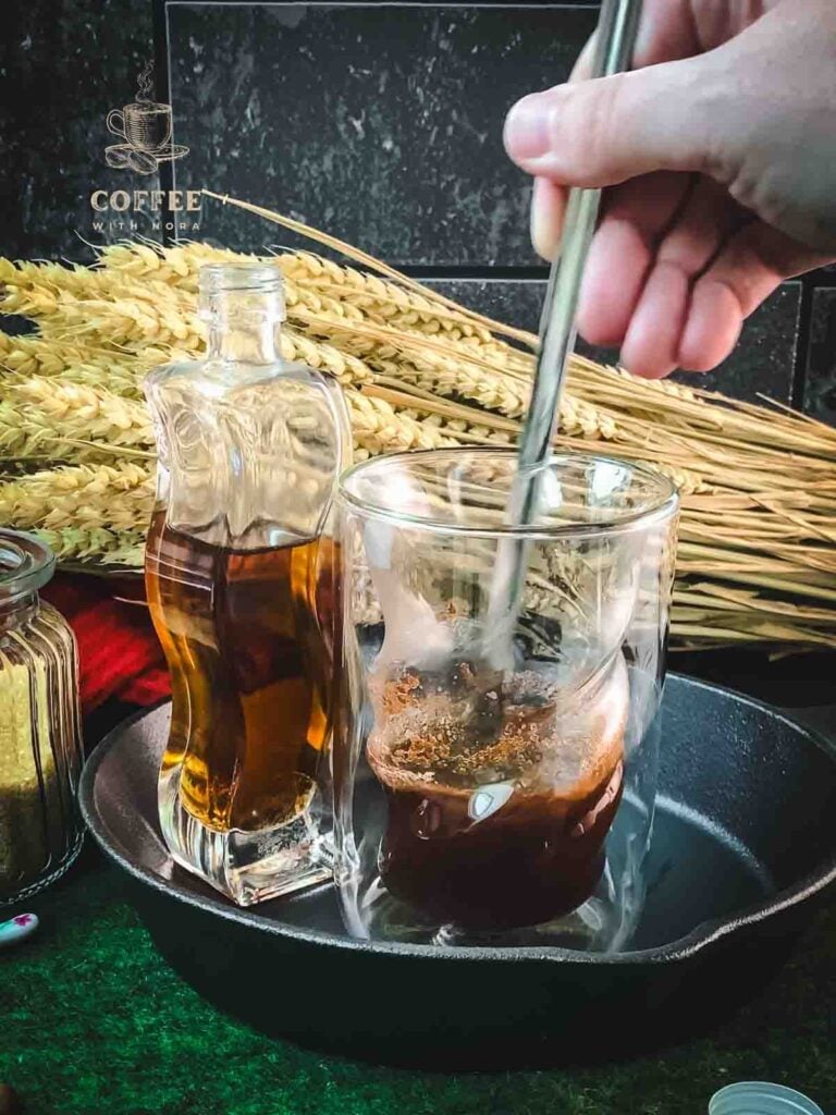 Combine Espresso, brown sugar simple syrup, salt and cinnamon well.