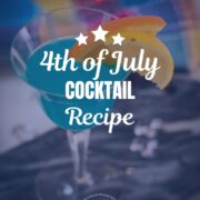 Gorgeous blue lady cocktail, served in vintage glass, garnished with an orange and an lemon slice side by side. Placed on a marbled plate.