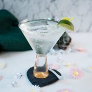 Easy and delicious! Vermouth tonic, in a gorgeous cocktail glass, placed on a black heartshaped slate coaster.