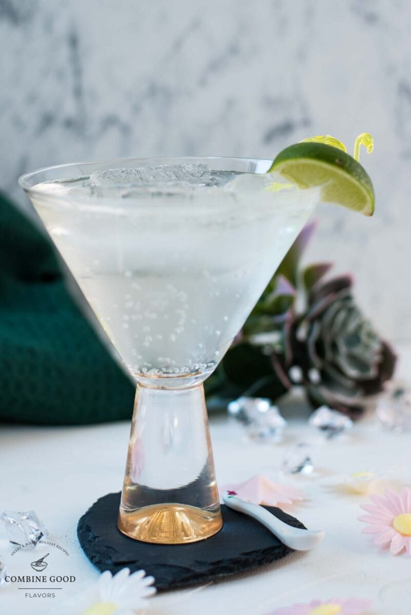 Easy and delicious! Vermouth tonic, in a gorgeous cocktail glass, placed on a black heartshaped slate coaster.