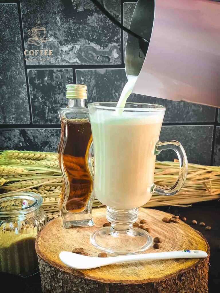 Top with frothed oatmilk half n half.