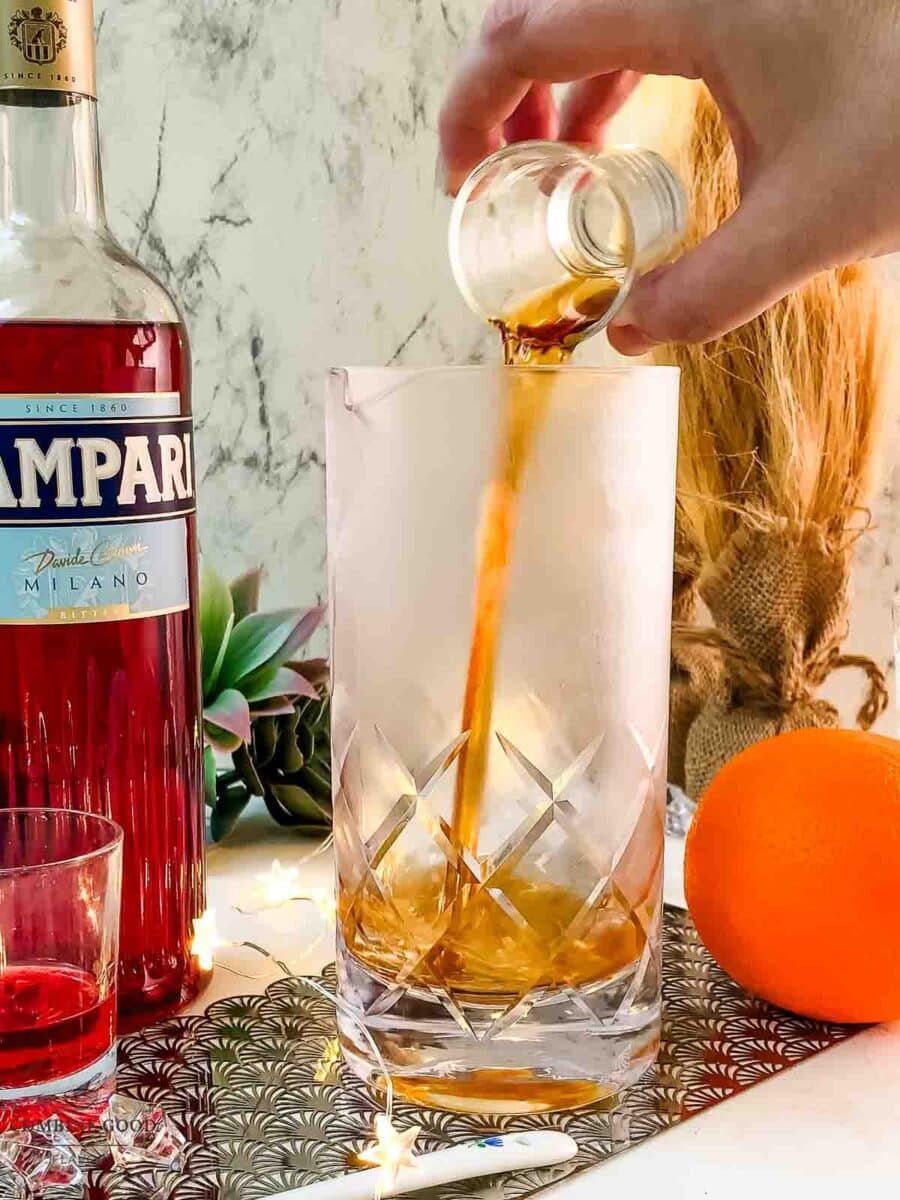 Add sweet vermouth to the stirring glass.
