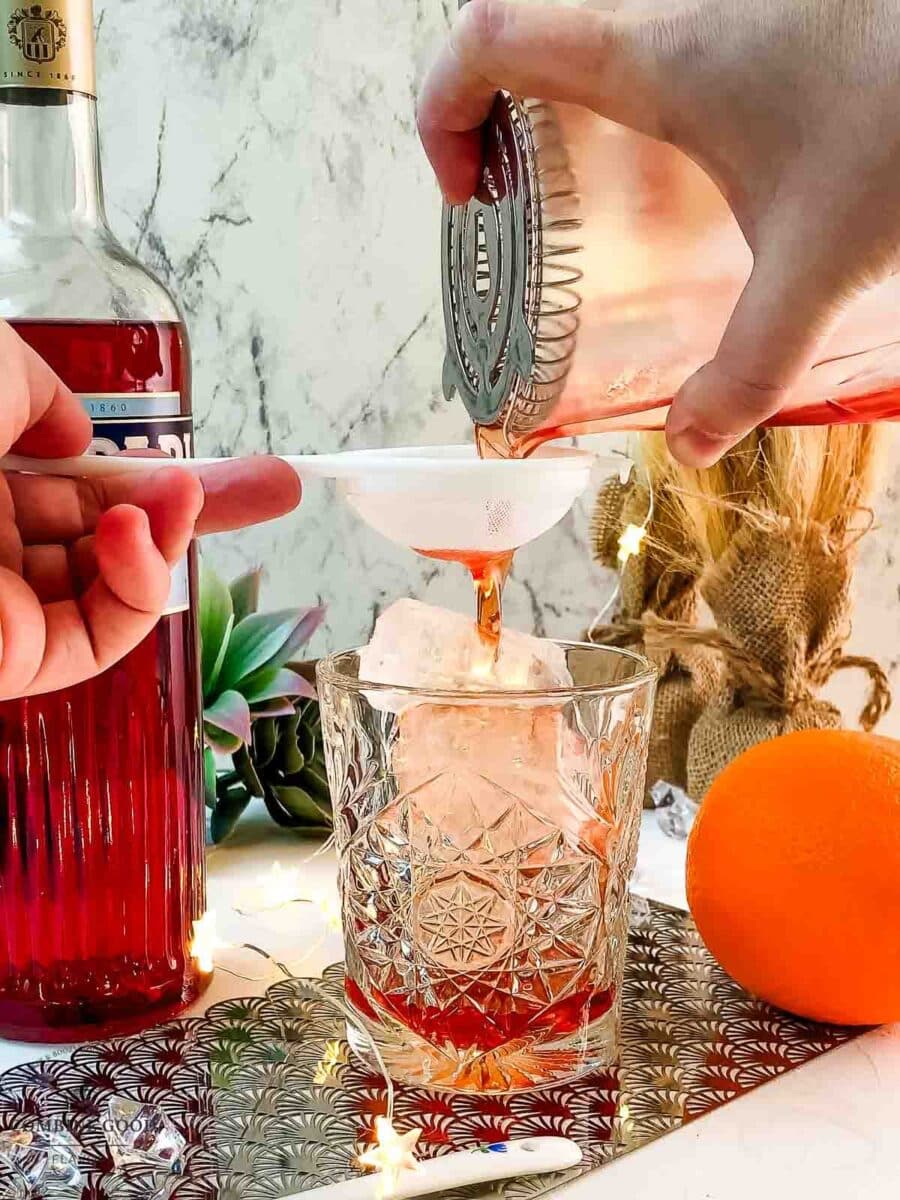 Fine strain into the serving glass.