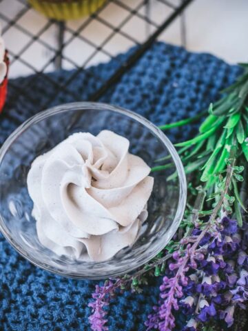 Sweet and gorgeous lavender buttercream piped in glass jar.