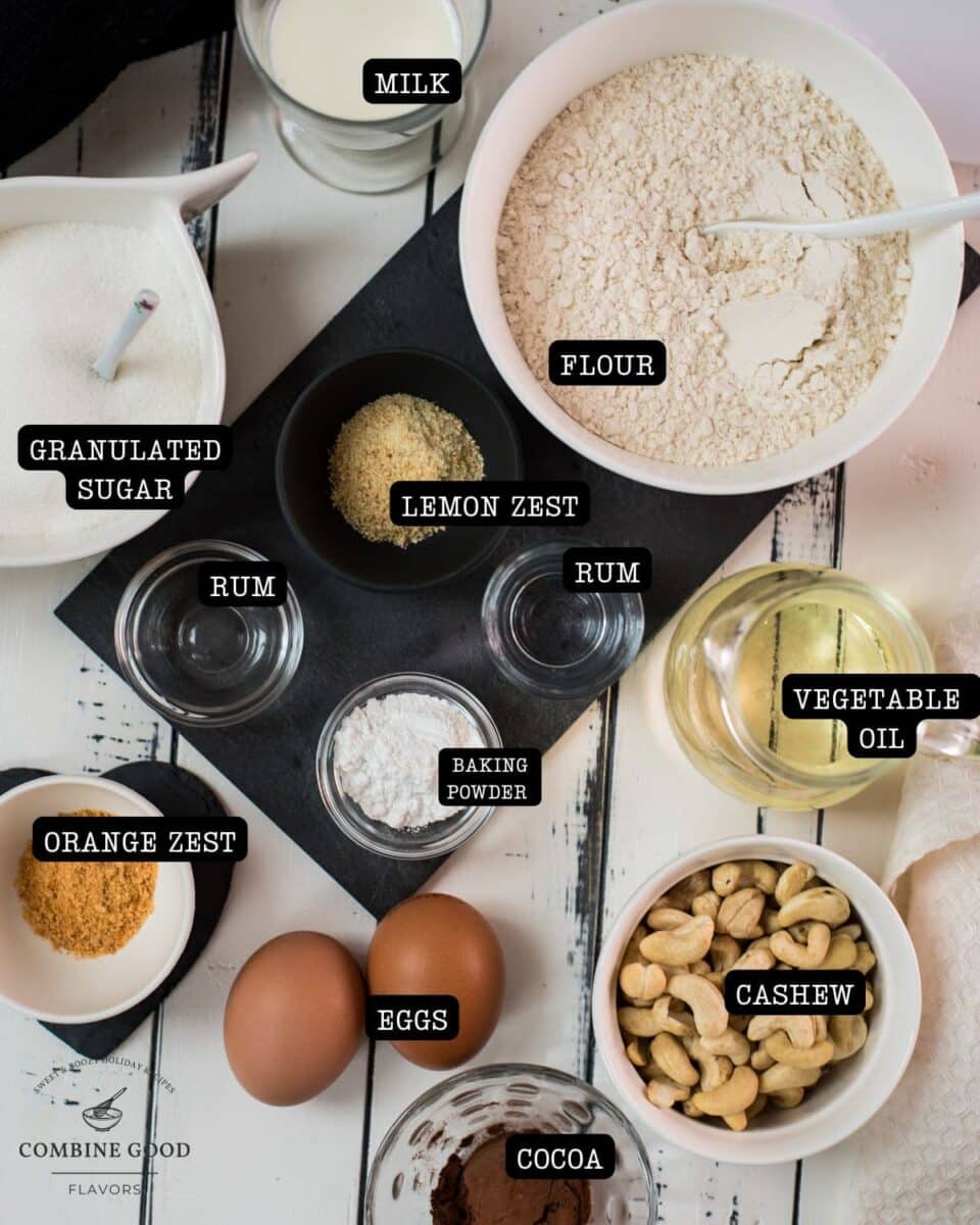 Ingredients rum muffins - milk, flour, granulated sugar, rum, lemon zest, orange zest, baking powder, eggs, cocoa, cashew nuts, and vegetable oil.