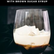 Simple GT glass, filled with delicious brown sugar white Russian. Placed on a black slate plate.