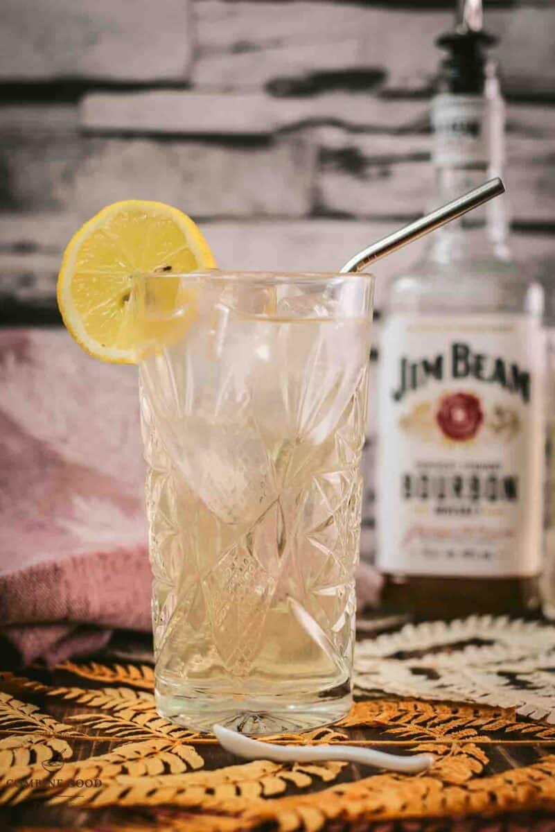Gorgeous Bourbon Highball cocktail, made with Bourbon and Ginger beer. Served with a lemon slice.