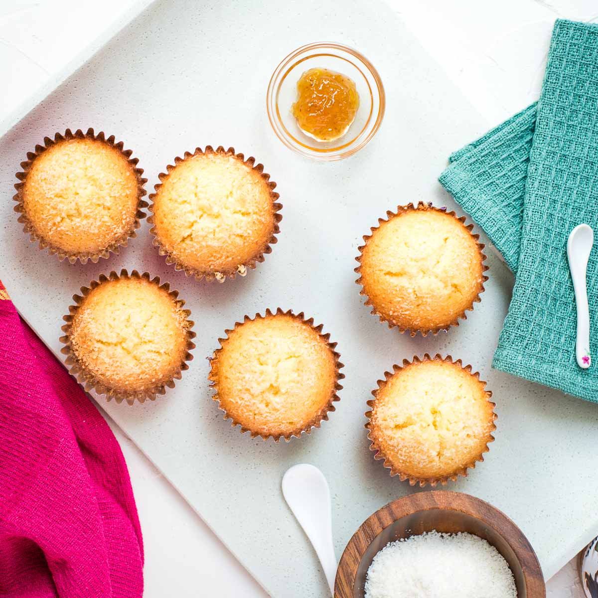 Gorgeous coconut muffins, placed in white plate.