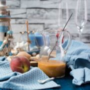 Bellini ready peach puree in a glass jug.