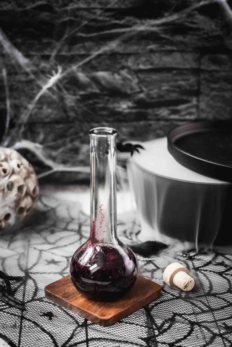 Eerily beautiful, decorated with cobwebs and a black, steaming cauldron.