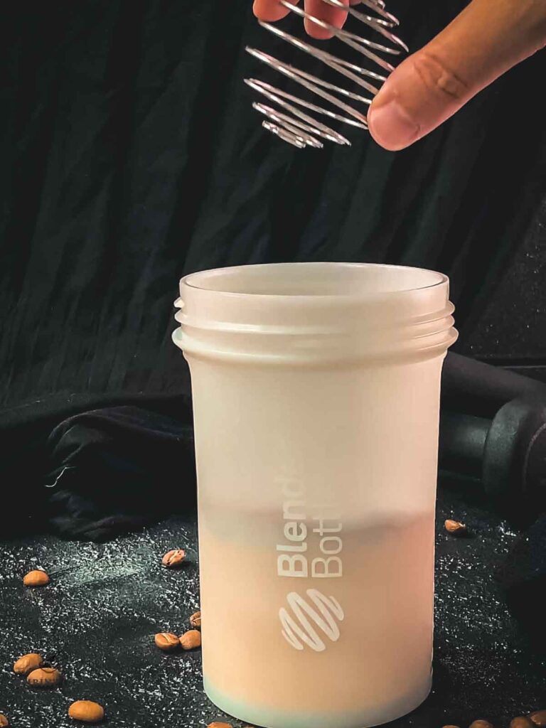 Add the shaker ball to the blender bottle.
